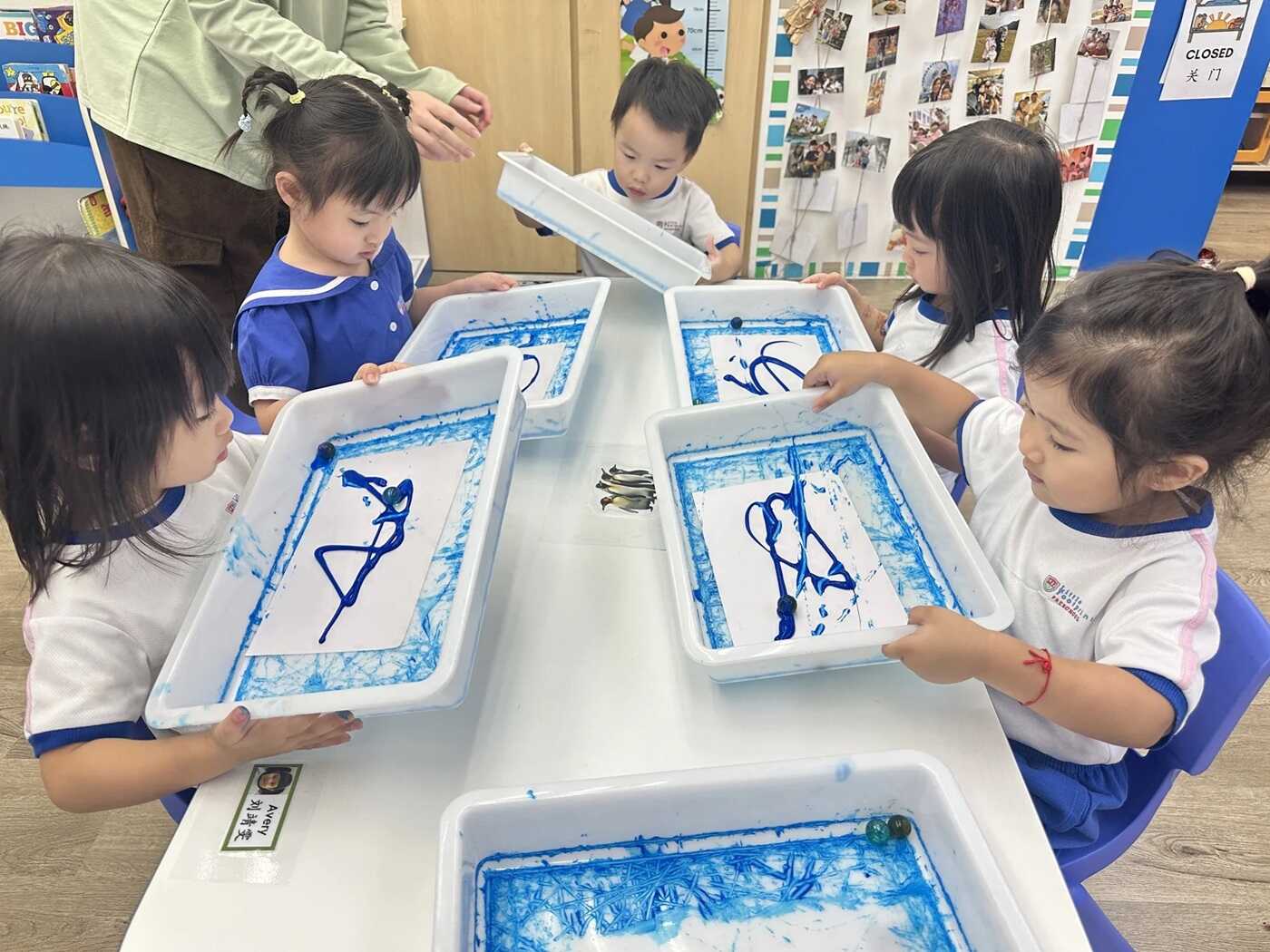 Preschoolers marbles activity