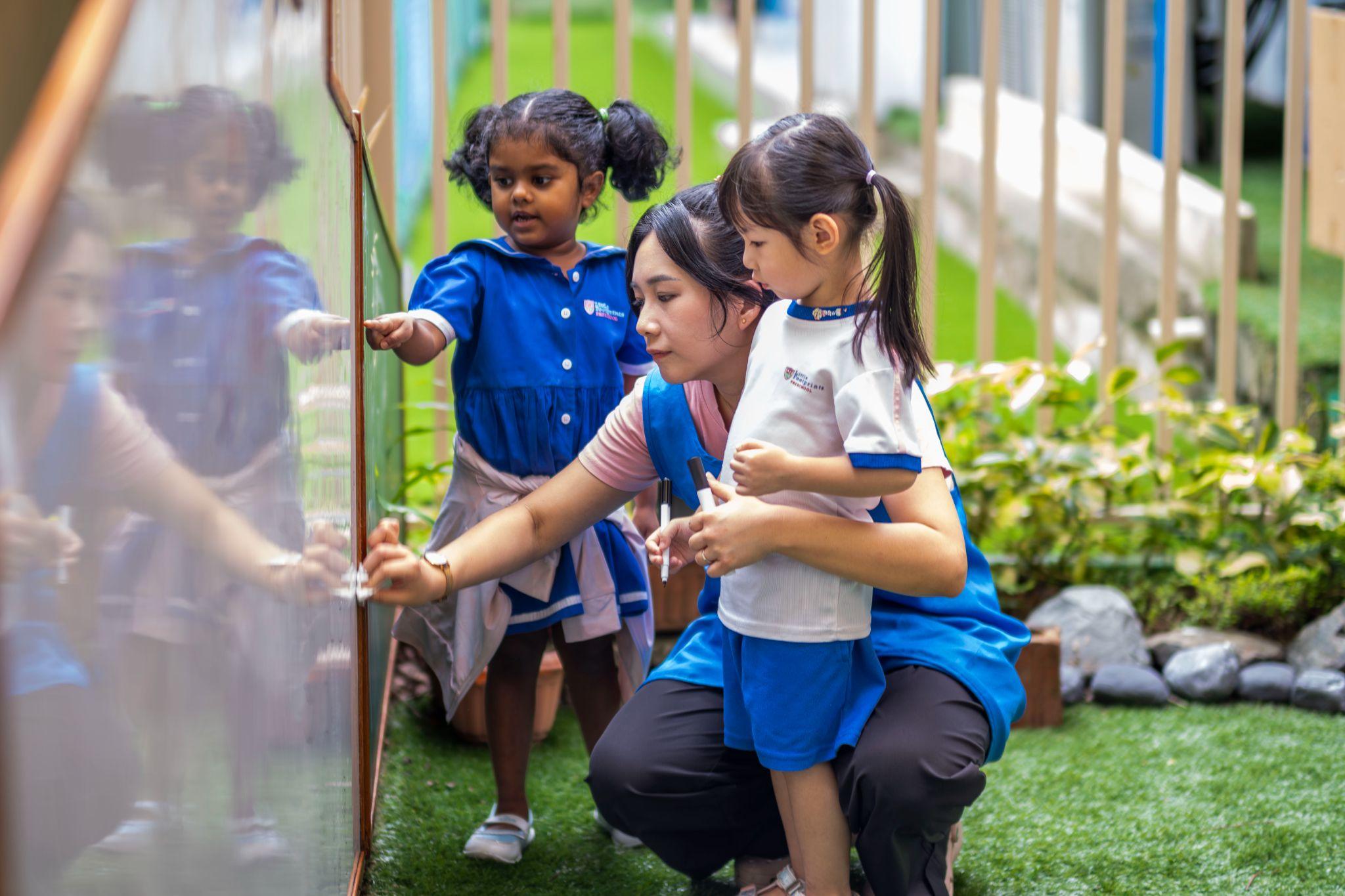 children-playing-w-teacher