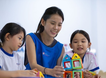 preschool teacher with kids
